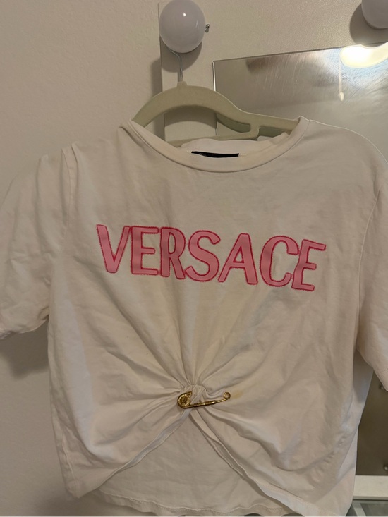 Versace Tops - Versace White Short Sleeve Tee with Pink Logo and Gold Pin